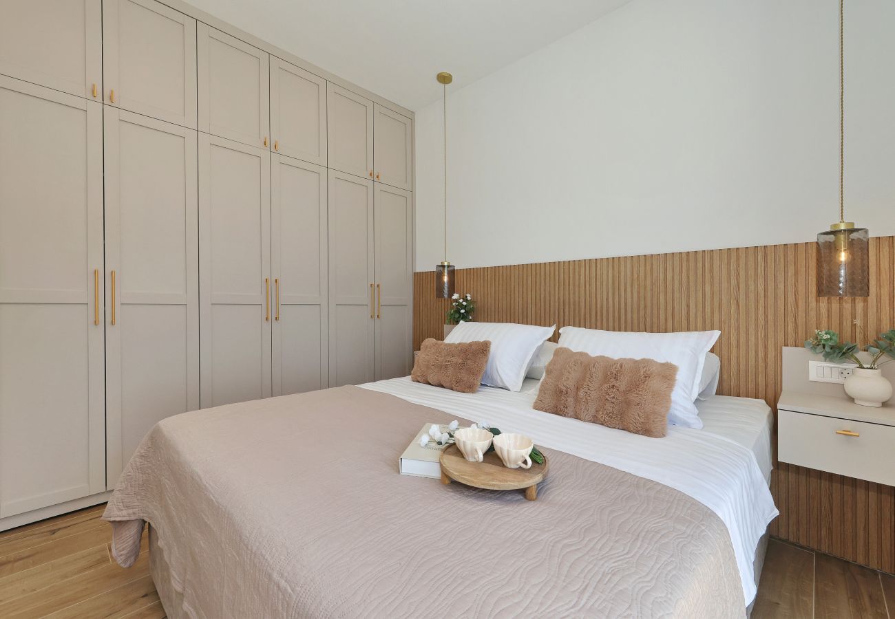 Bedroom of Villa Diaria with king-size bed, bedside tables and large wardrobe in Vrsi