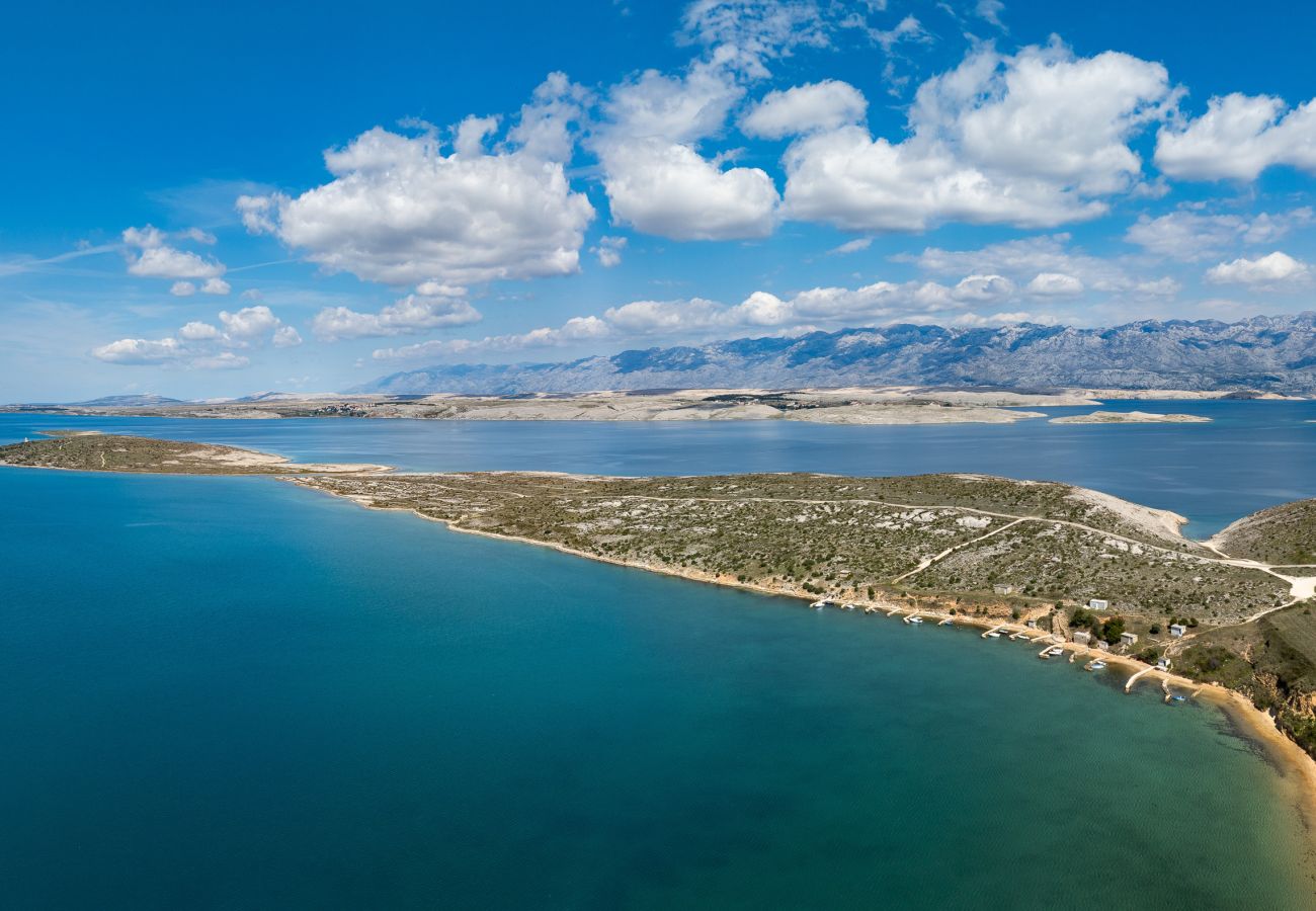 Coastal landscape around Vrsi with blue sea, bays and Velebit mountains