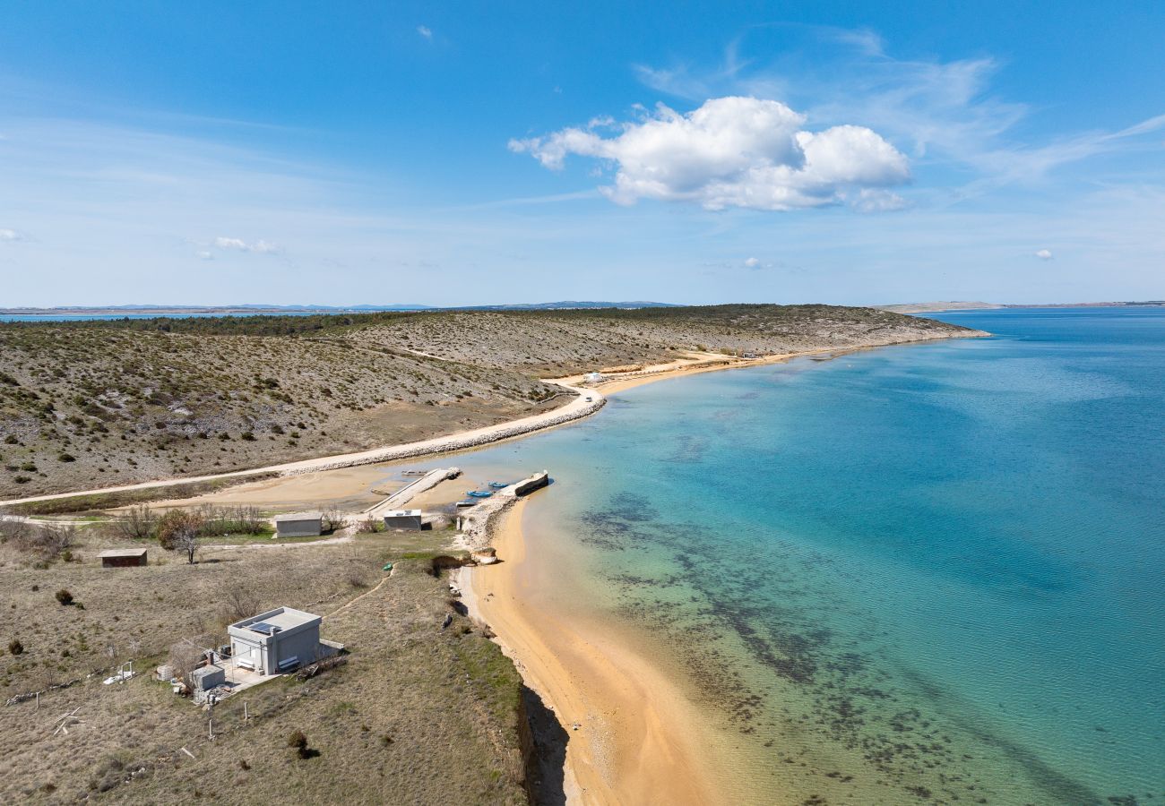 Beach and coastal landscape near Vrsi with clear water and quiet swimming bay
